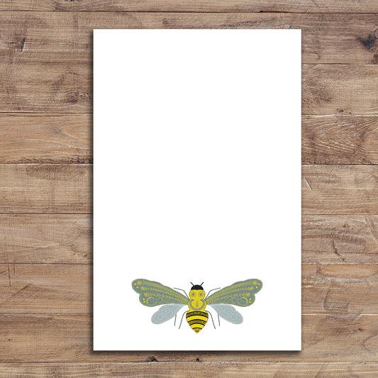 Boho Style Bee graphic on 5.5" x 8.5" notepad on wood background 