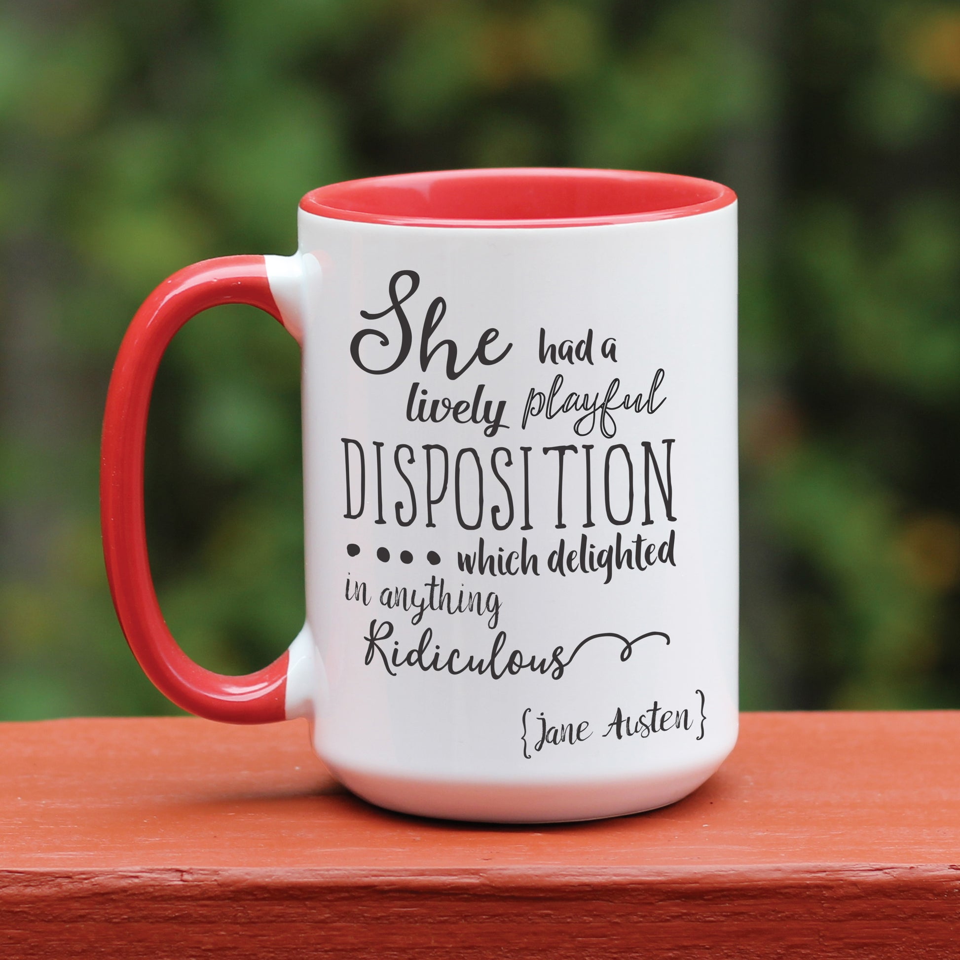 Jane Austen Pride and Prejudice quote white coffee mug with red handle.
