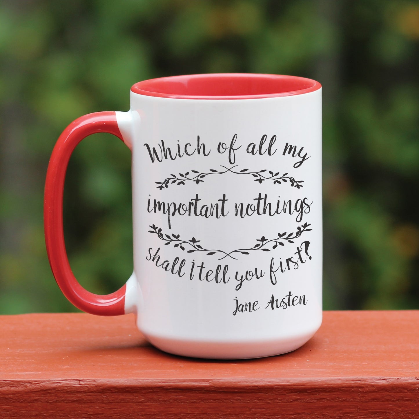 Jane Austen Pride and Prejudice quote white coffee mug with red handle.