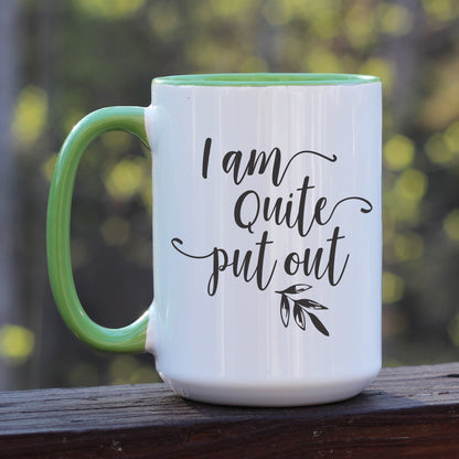 I am quite put out mug with green handle