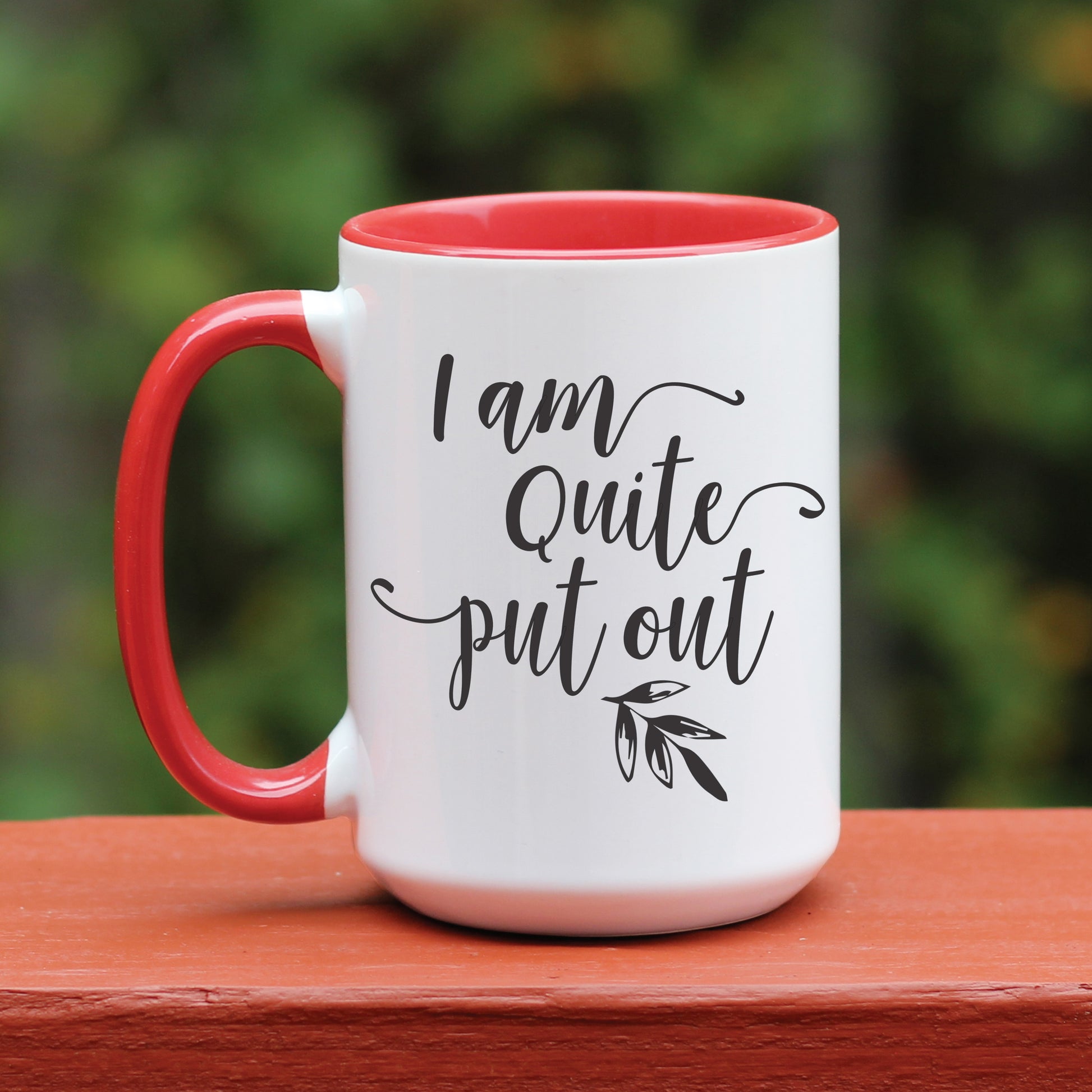 I am quite put out mug with red handle