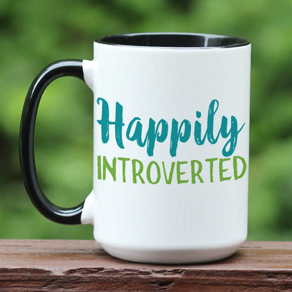 Happily Introverted ceramic coffee mug with black handle