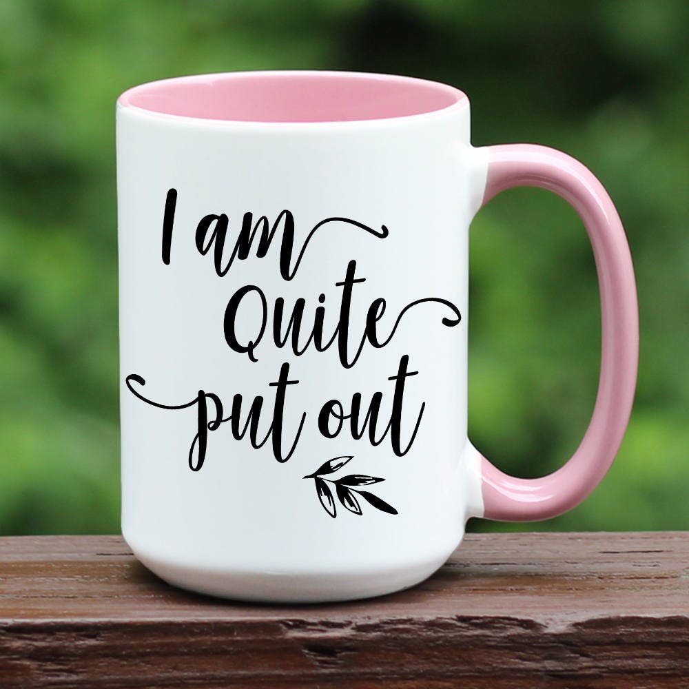 I am quite put out mug with pink handle
