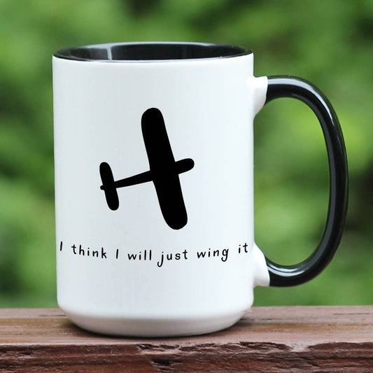 Airplane pilot I think I will just wing it with plane silhouette on white mug with black handle.