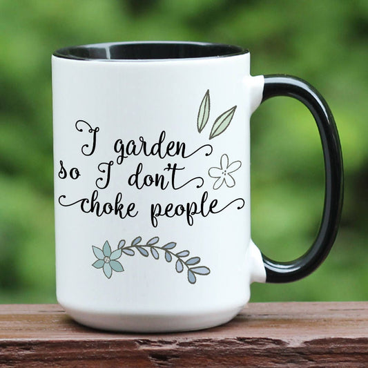 I garden so I don't choke people mug with black handle