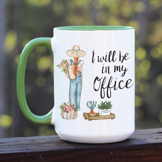 Garden I will be in my office with girl gardener and plants on a white mug with green handle.