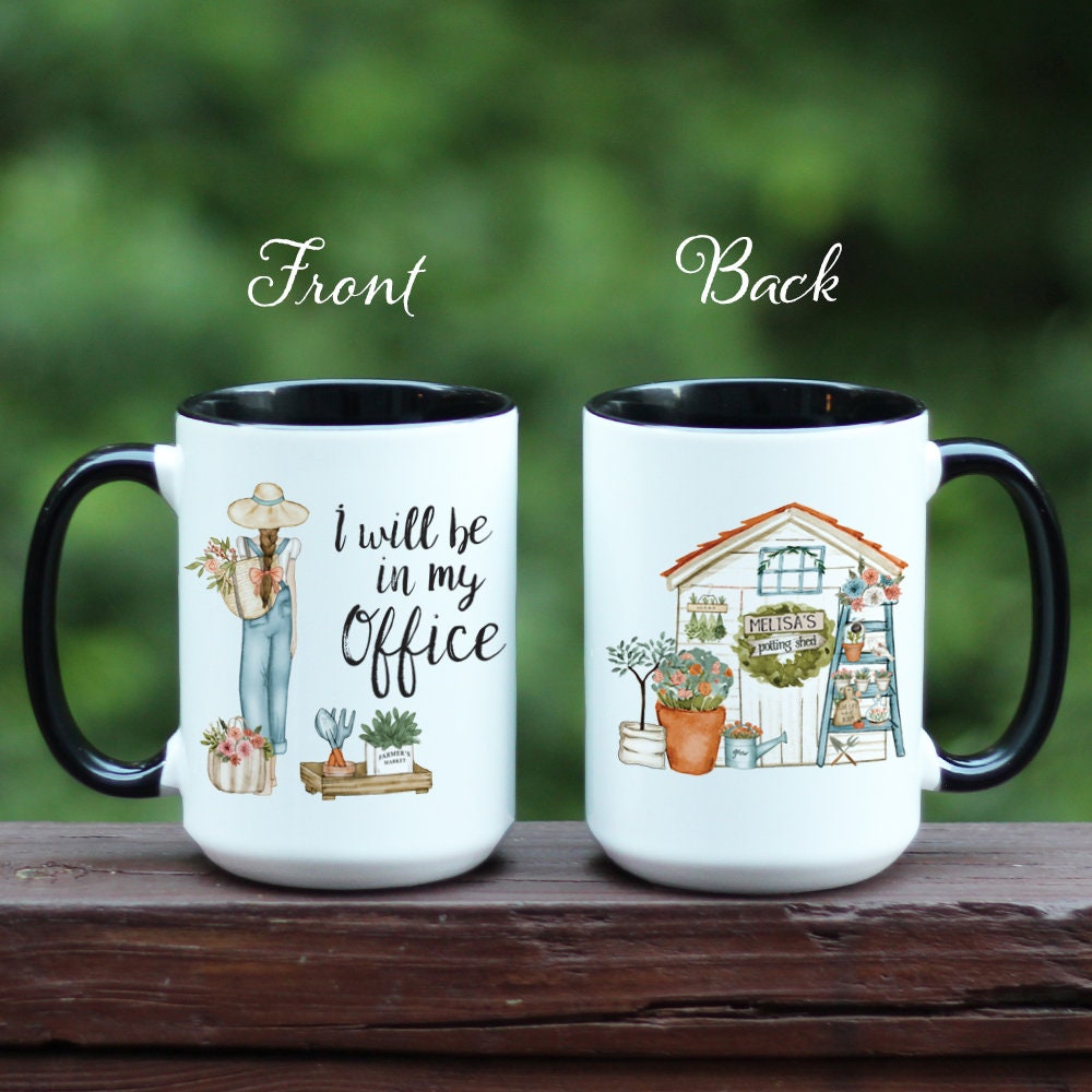 Front and back of Garden I will be in my office with girl gardener and plants on a white mug with black handle.