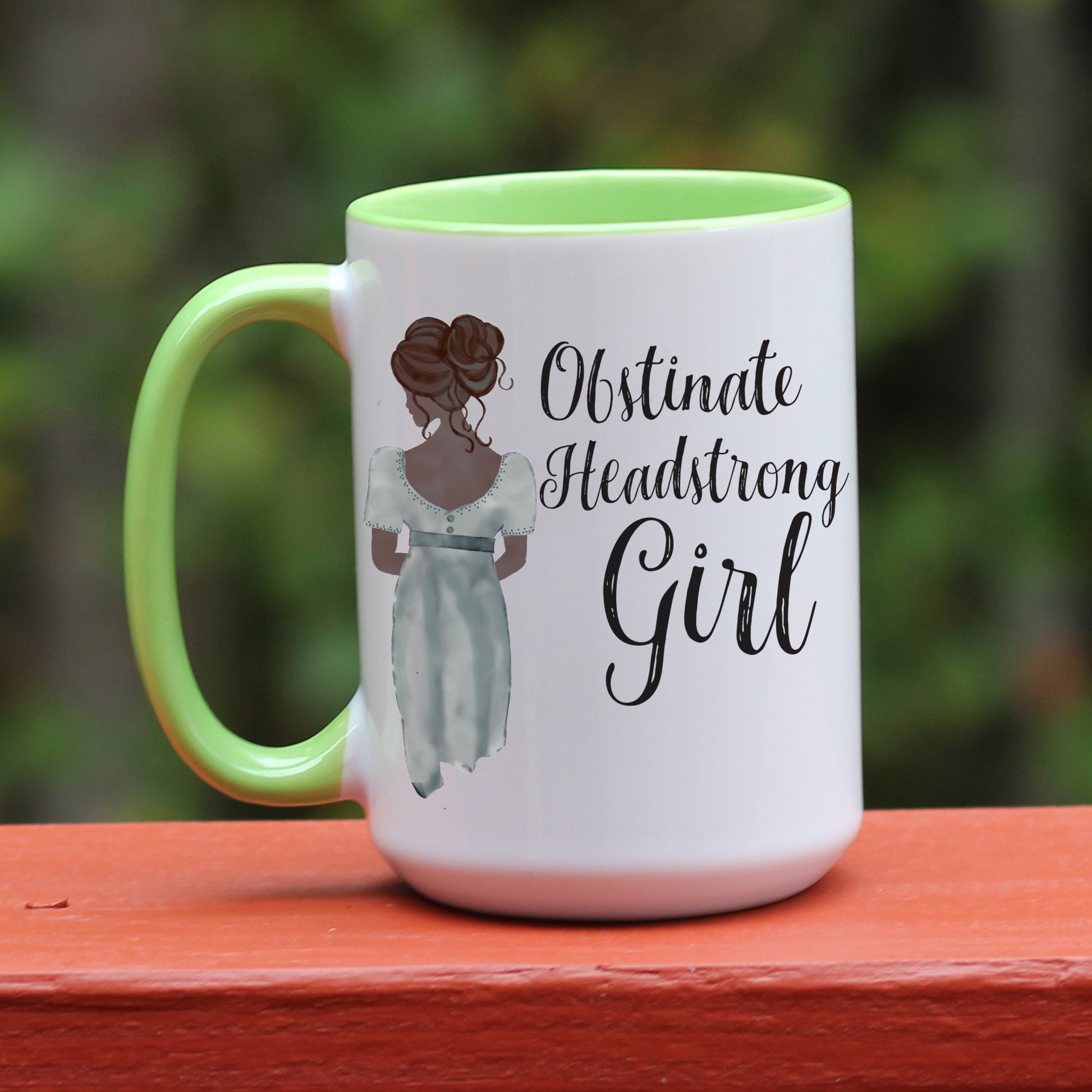 Jane Austen Pride and Prejudice Obstinate Headstrong Girl quote white coffee mug with green handle.