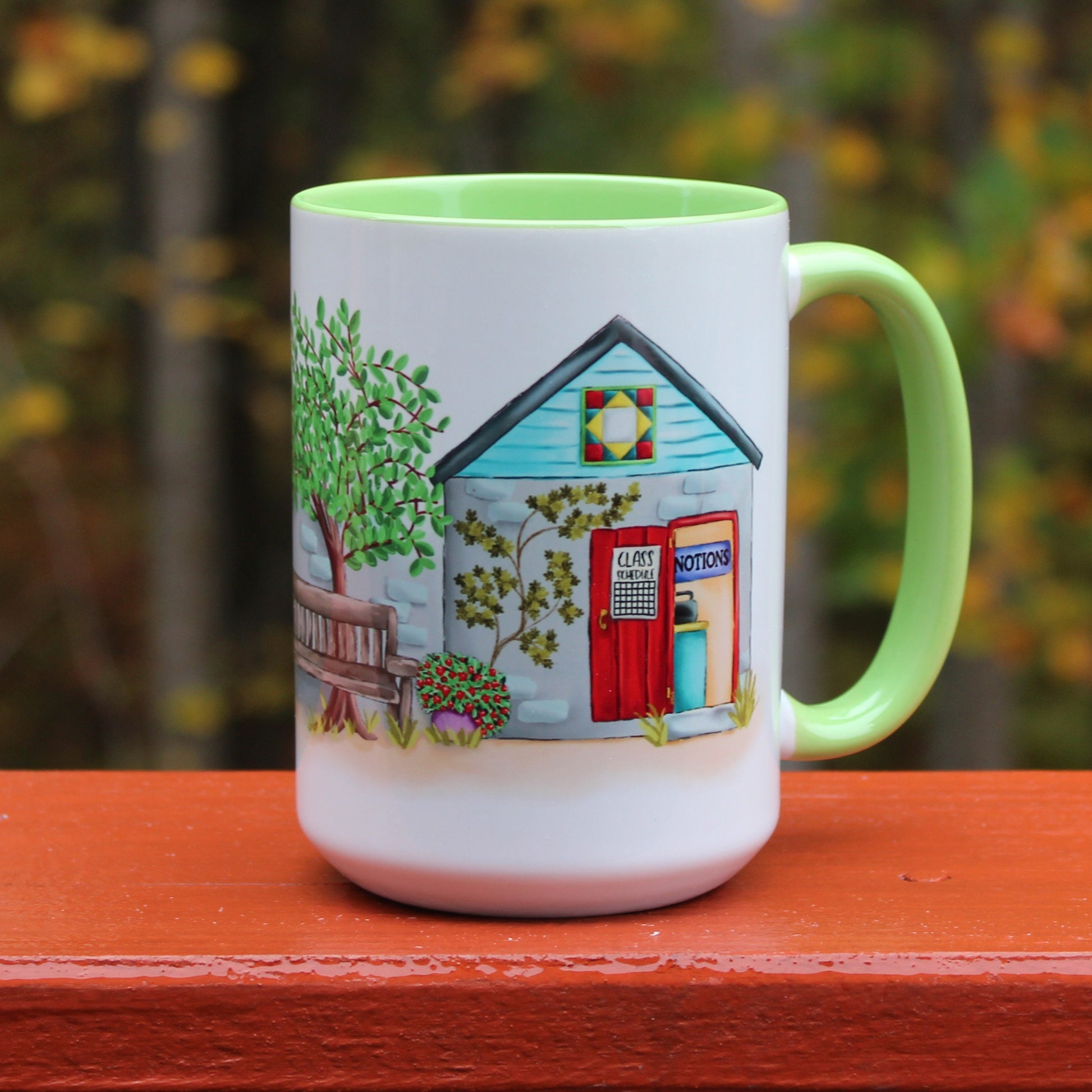 Back view of Quilt Shoppe Mug featuring shop back door on green mug
