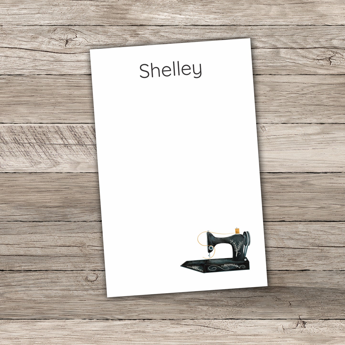 Personalized notepad with the name 'Shelley' and vintage sewing machine design, ideal for quilting enthusiasts, custom stationery lovers, and unique gift ideas.