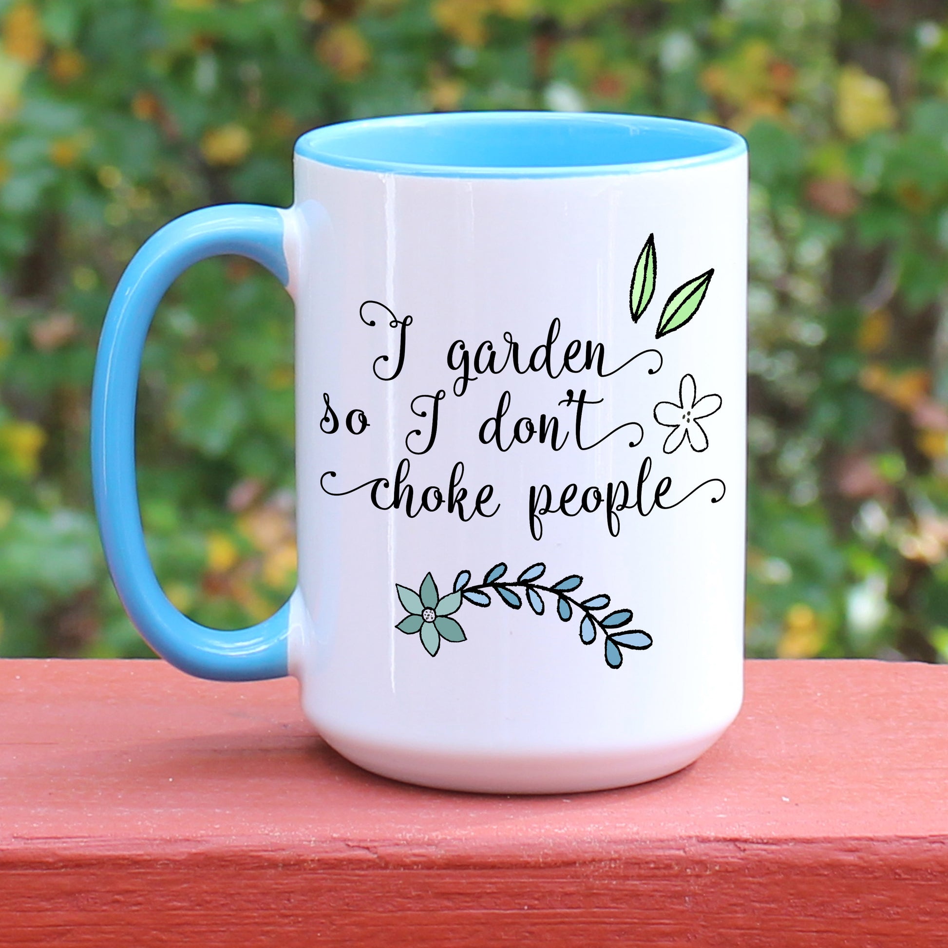 I garden so I don't choke people mug with blue handle