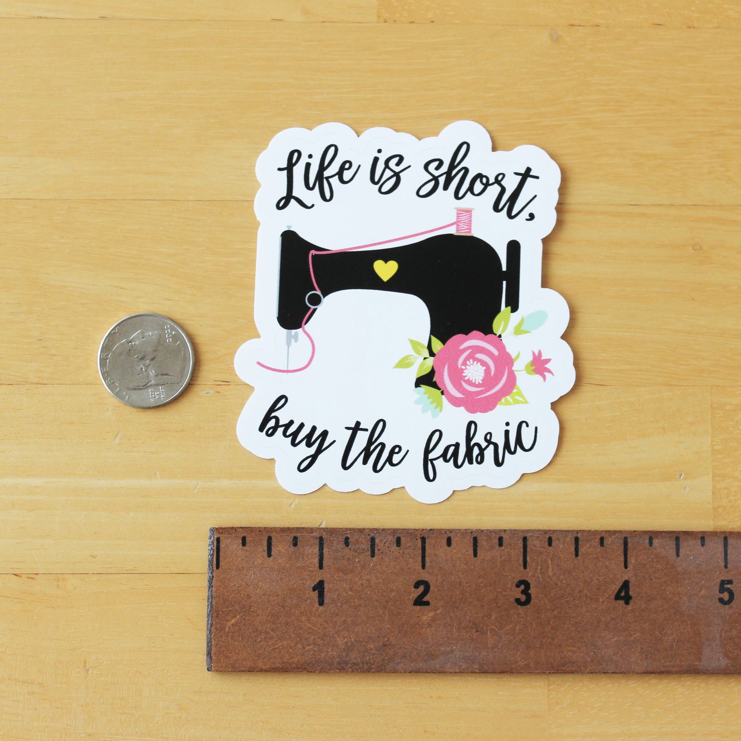 Life is short Buy the fabric Quilting Sewing sticker with pink accents measuring 3.5"